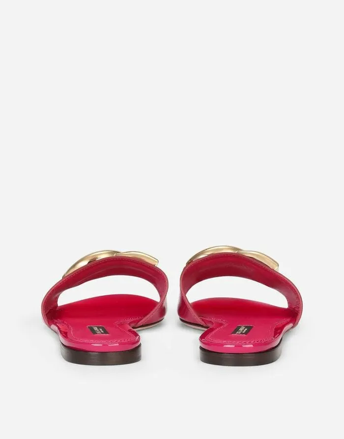 Dolce and Gabbana Slides And Mules Women Patent Leather Slides With DG Logo Fuchsia Dolce and Gabbana Slides And Mules Women Patent Leather Slides With DG Logo Fuchsia