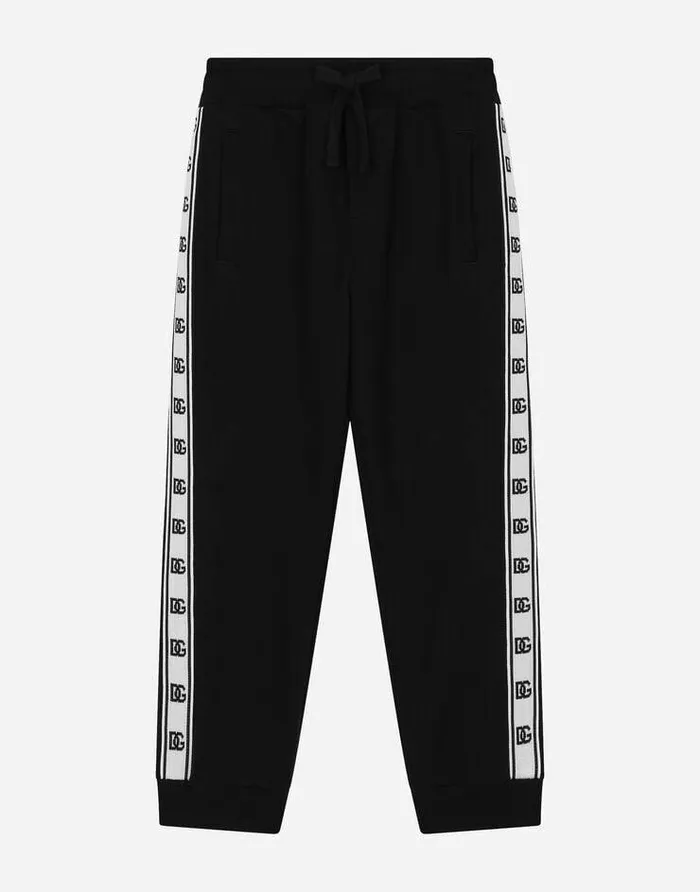 Dolce and Gabbana Trousers And Shorts Children Cotton Jogging Pants With Logo Band On Side Black Dolce and Gabbana Trousers And Shorts Children Cotton Jogging Pants With Logo Band On Side Black