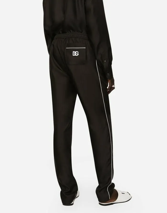 Dolce and Gabbana Trousers And Shorts Men Silk Jogging Pants With DG Embroidered Patch Black Dolce and Gabbana Trousers And Shorts Men Silk Jogging Pants With DG Embroidered Patch Black
